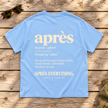 The Après Definition Tee — back view flat lay on wood tabletop