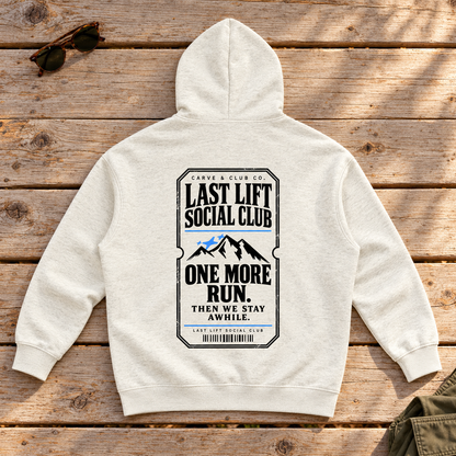 Last Lift Ticket Hoodie — back view flat lay on wood tabletop
