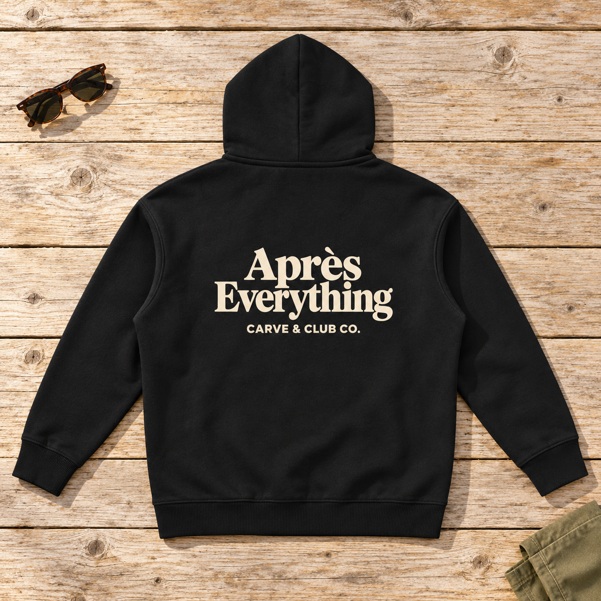 Après Everything Signature Hoodie — back view flat lay on wood tabletop