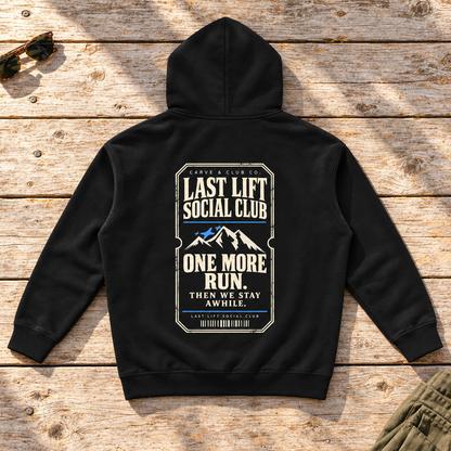 Last Lift Ticket Hoodie — back view flat lay on wood tabletop