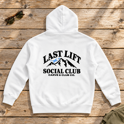 Last Lift Social Club Hoodie — back view flat lay on wood tabletop