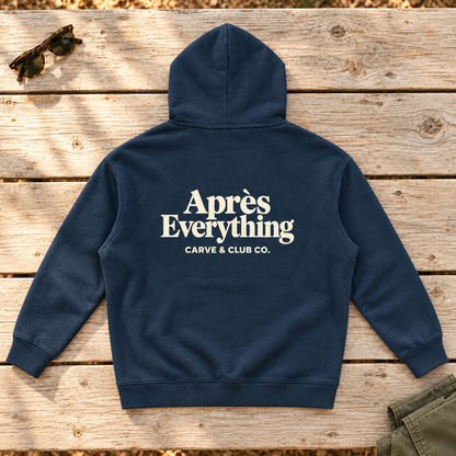 Après Everything Signature Hoodie — back view flat lay on wood tabletop